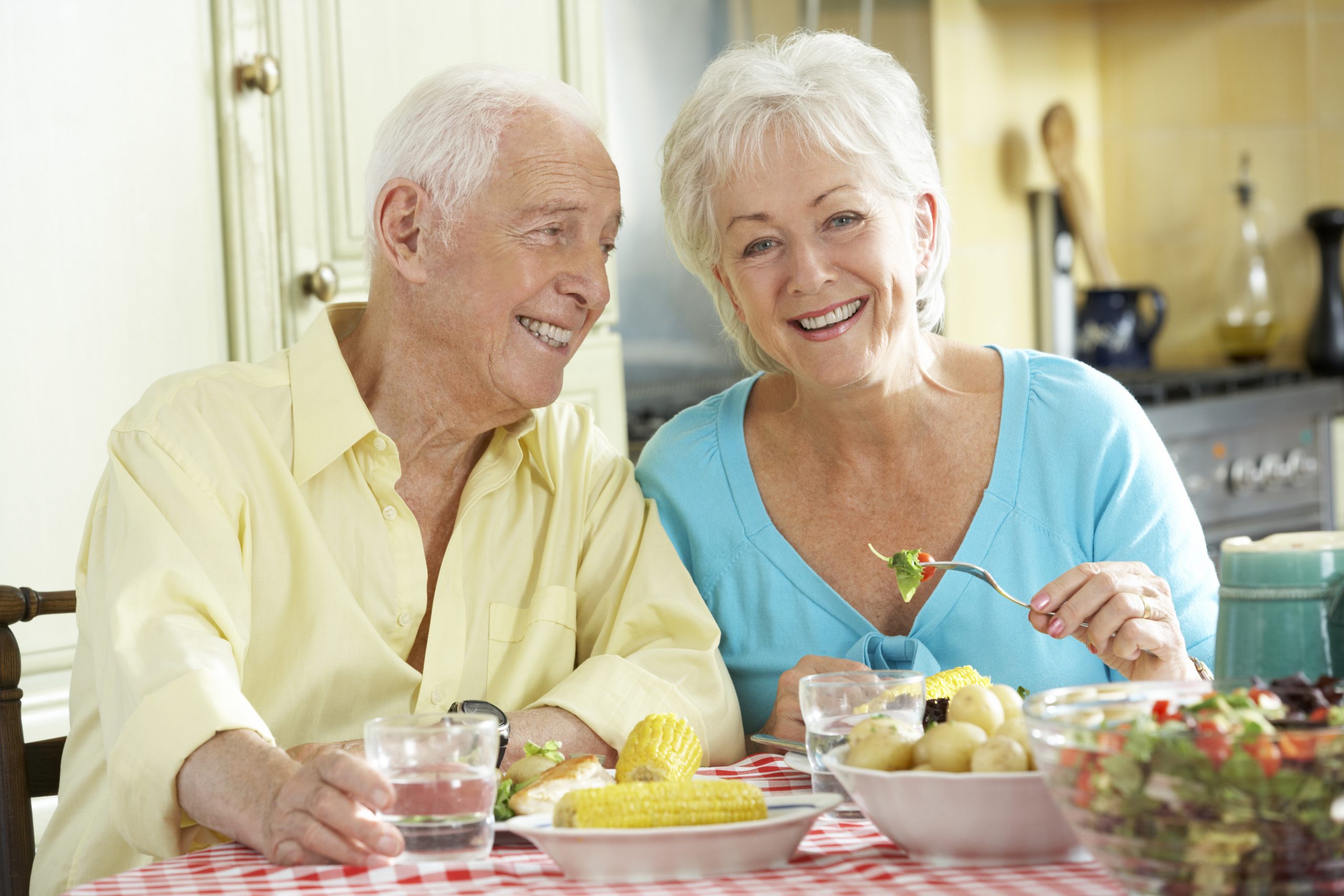 senior couple enjoys lunch